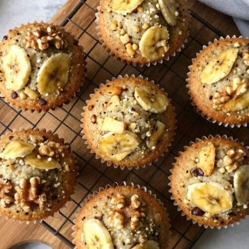 banana nut muffins with walnut pieces visible on top