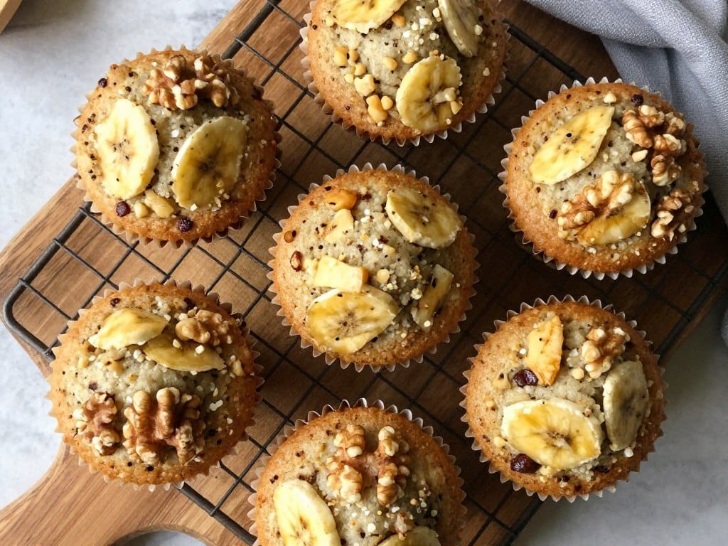 banana nut muffins with walnut pieces visible on top