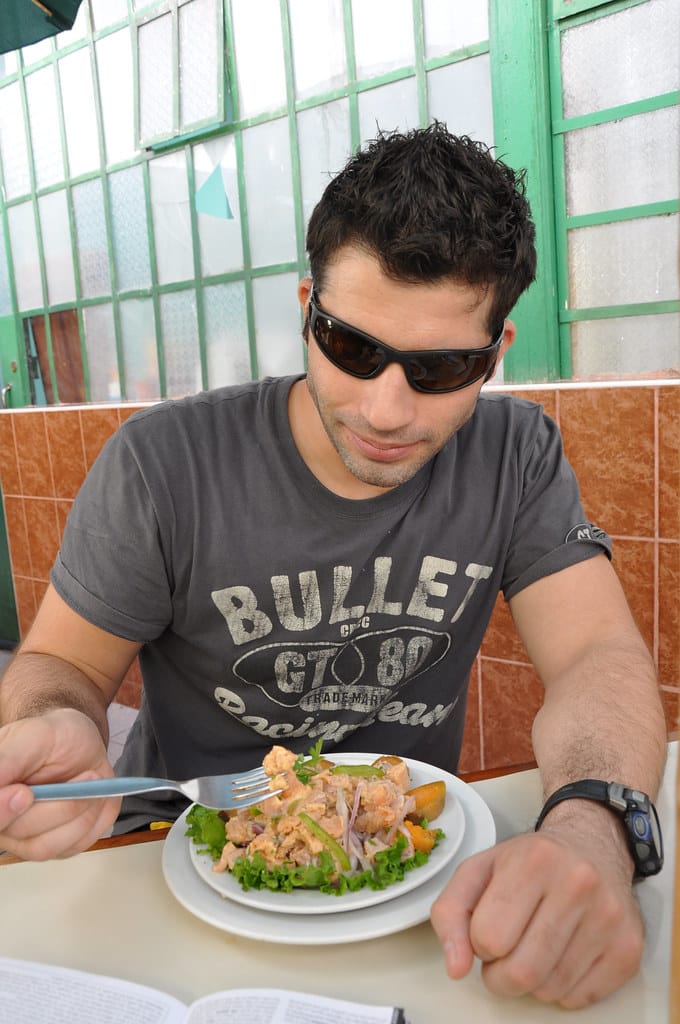 Fresh Peruvian ceviche with raw fish, red onion, and lime juice