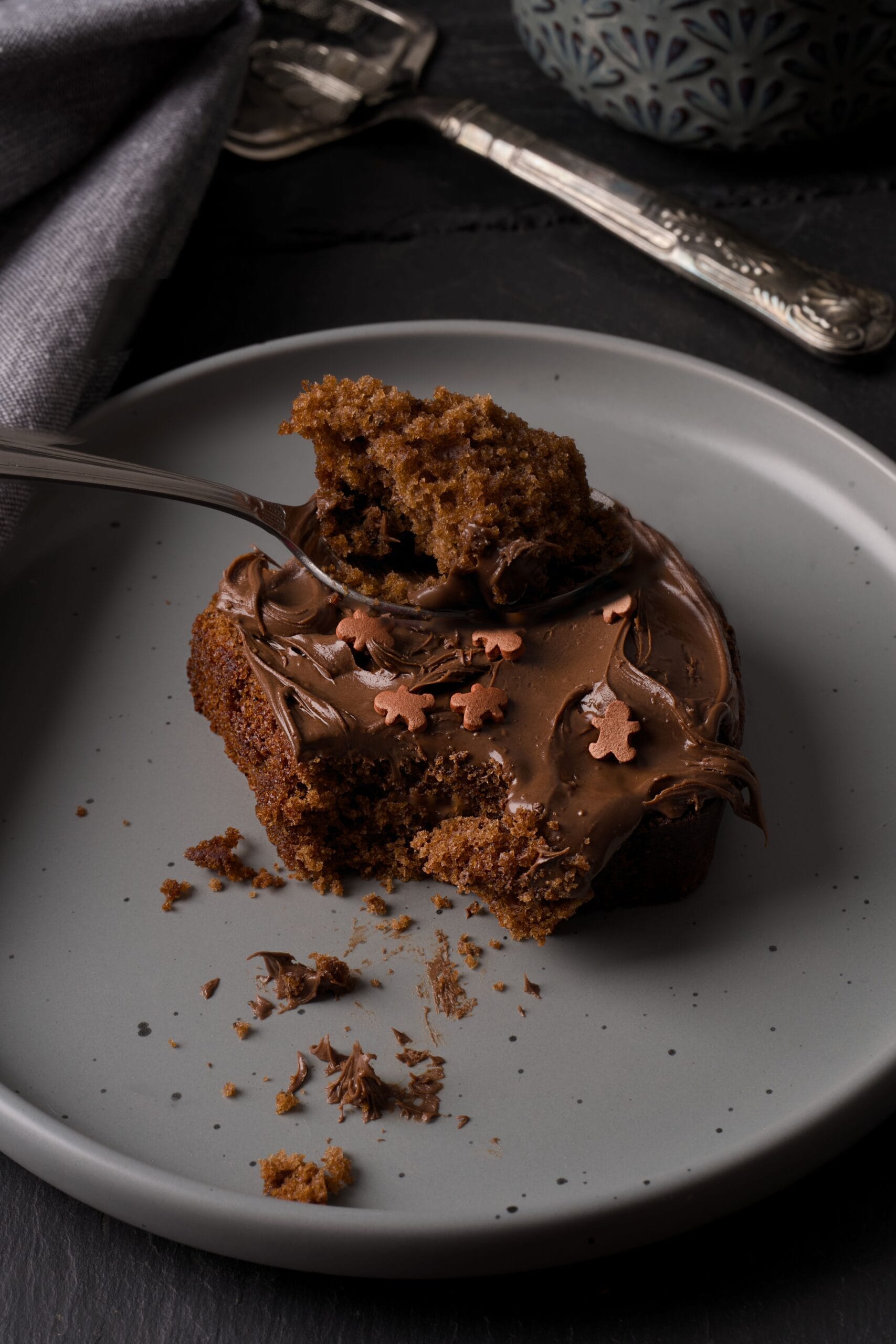 Fudgy brownie cake recipe slice with a dense crumb served on a plate